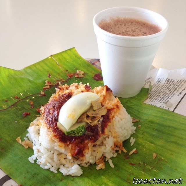 My rather yummy free Nasi Lemak with hot Milo for breakfast that morning. 
