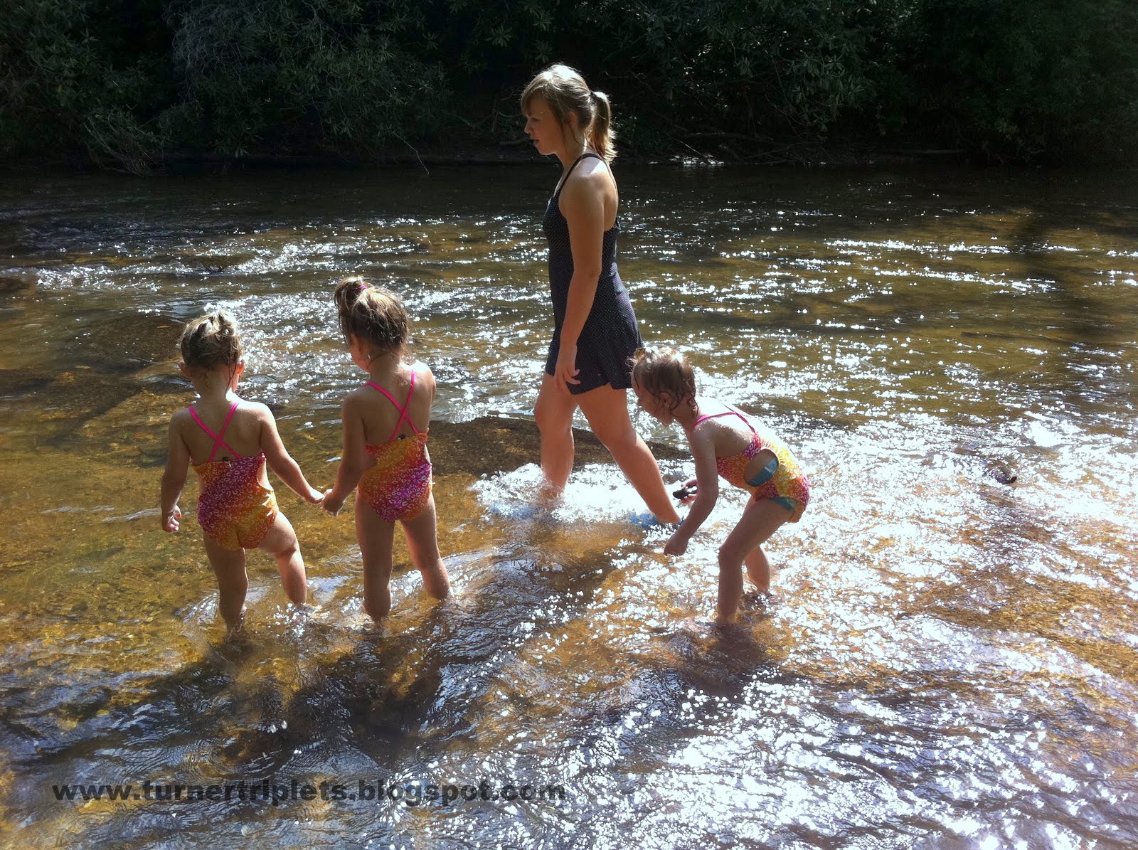 The Turner Triplets Playing In The River