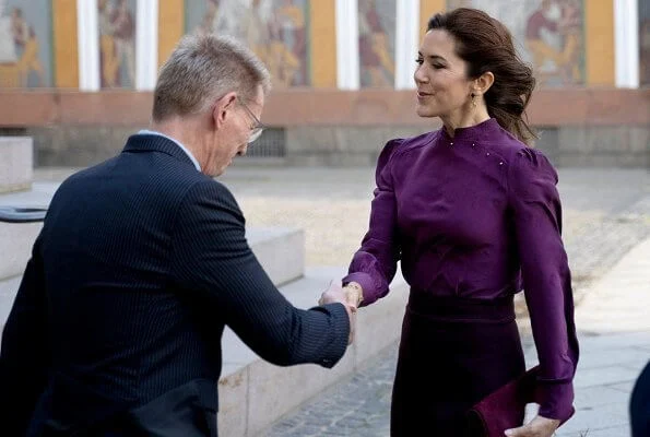 Crown Princess Mary, wore a burgundy blouse and burgundy skirt, Prada suede pumps, she carries Hugo Boss clutch