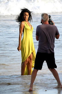  Rihanna posing in a yellow dress for a new photoshoot