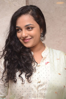 nitya menon at 100 days of love audio launch nitya menon at 100 days of love audio launch