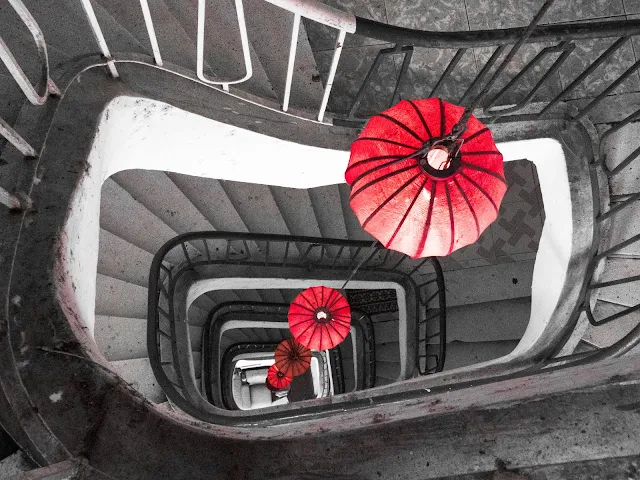 Non-touristy Things to do in Ho Chi Minh City: Staircase with red lanterns in HCMC Vietnam
