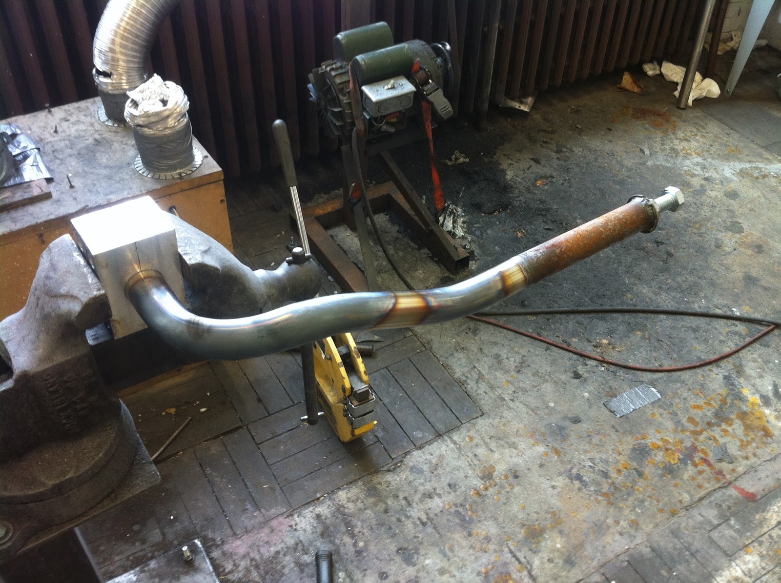 Roc City Cafe Racers: Sand Bending a CB750 Exhaust