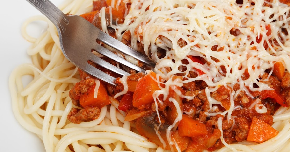 Spaghetti Bolognese with Fresh Tomatoes and Two Cheeses
