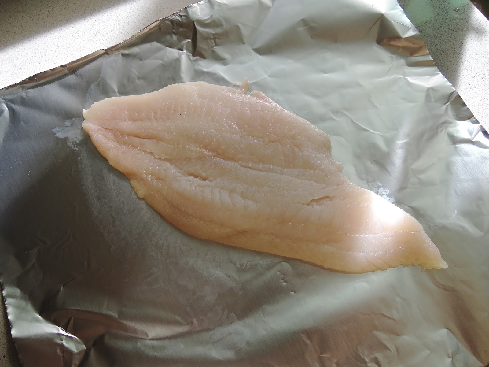 The Briny Lemon Blackened Flounder with Garlic Sautéed Kale