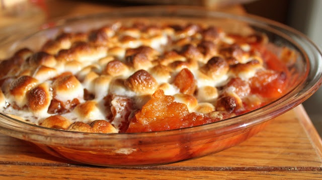 this is how to make homemade sweet potatoes with Amaretto and toasted marshmallows for Thanksgiving Dinner
