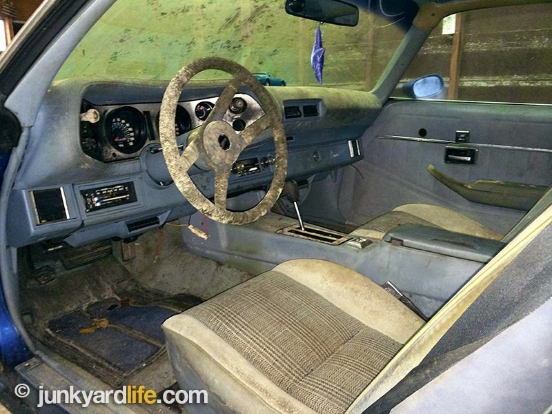 Sit down in the standard blue cloth seats on this 1978 Camro Z28 barn find.