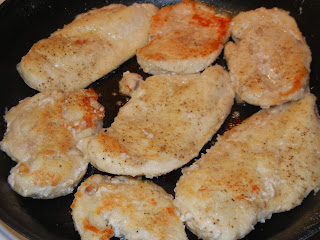 cooked chicken breast in a pan 
