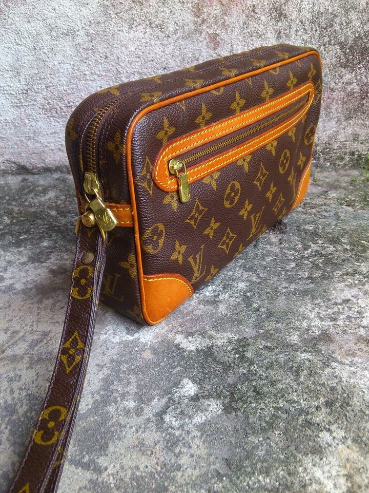 bundle ofNever: Louis Vuitton Monogram Pochette Marley Dragonne Clutch Bag - Sold