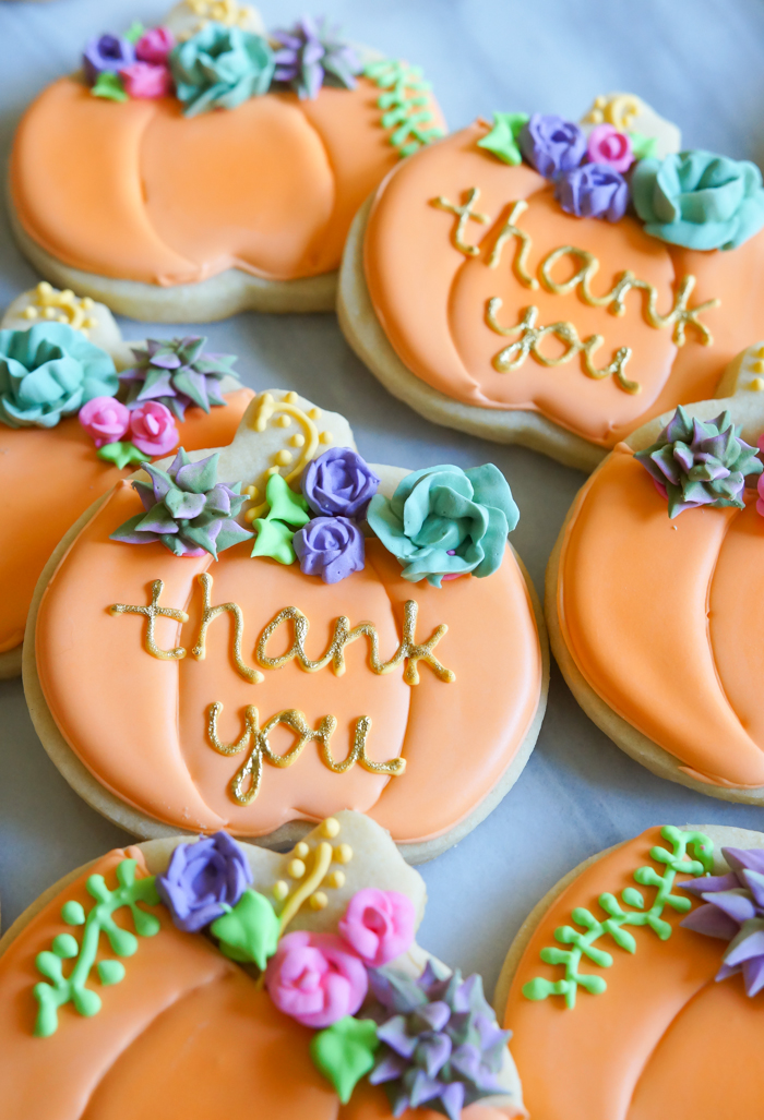 how to make decorated pumpkin cookies with royal icing succulents and roses | bakeat350.net