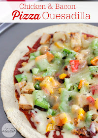 A chicken and bacon topped pizza quesadilla 