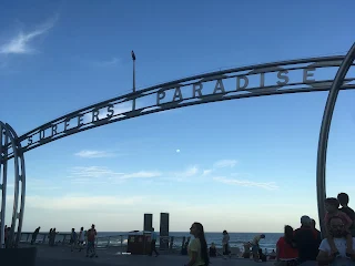 Surfer's Paradise beach sign during sunset in Gold Coast, Queensland, Australia