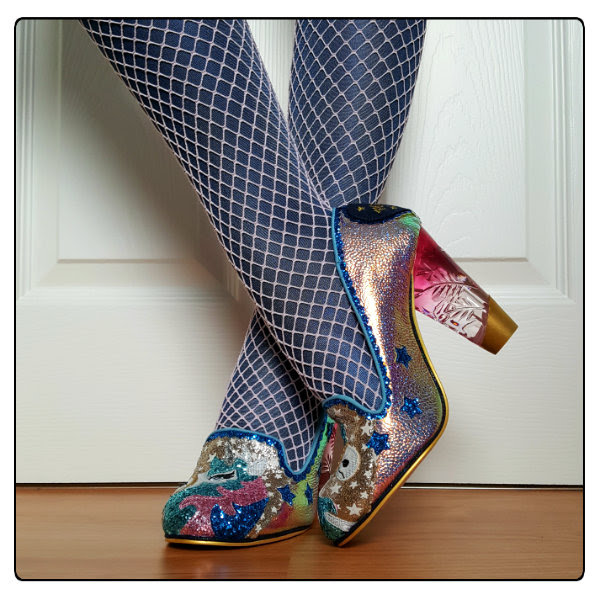 Wearing Irregular Choice Lady Misty unicorn courts crossed legs with glitter unicorn shoes and metallic tights