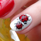 http://nails-arcenciel.blogspot.fr/2015/06/nail-art-coccinelles-en-relief-pierres.html