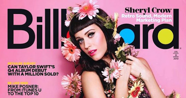 Katy Perry en la revista Billboard 2010. Cover o portada. Acá con flores cubriendo su atuendo y su cabeza.