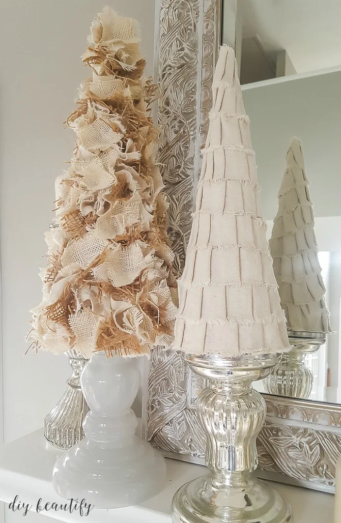 These burlap and drop cloth trees are easy to make and fabulous to decorate with! Get the tutorial at diy beautify.