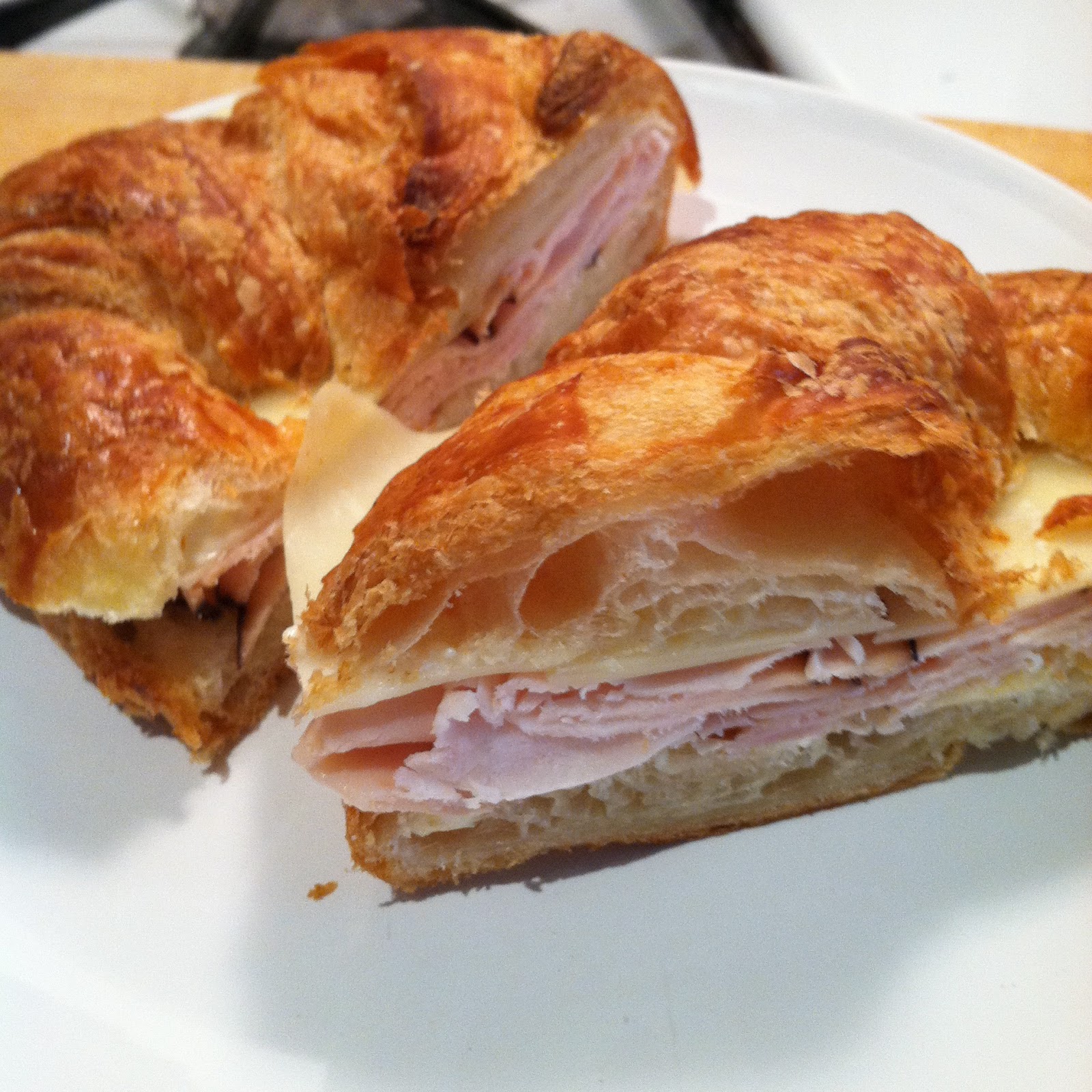 Quest for Delish: Turkey and Swiss on a Croissant