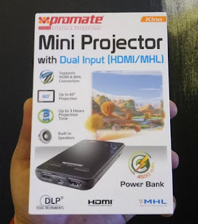 Promote Kino Mini Projector, sports up to 60" of display output, works with any devices that have HDMI/MHL support. Also acts as 4,500mAh powerbank