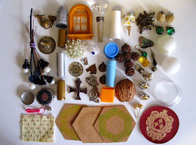 Contents of the bag of miniature bits, laid out in an orderly way.