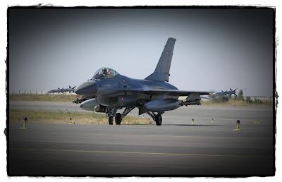 A Danish F-16 returning from a mission.