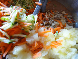 Shredded Zucchini, Shredded Carrots, Walnuts, and Crushed Pineapple added to Cake batter.