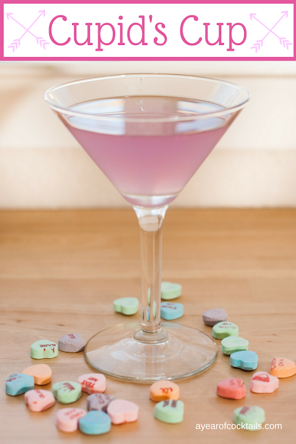 Cupid's Cup cocktail combines Hpnotiq Harmonie, vodka, cointreau and lime juice for a fun pink cocktail.