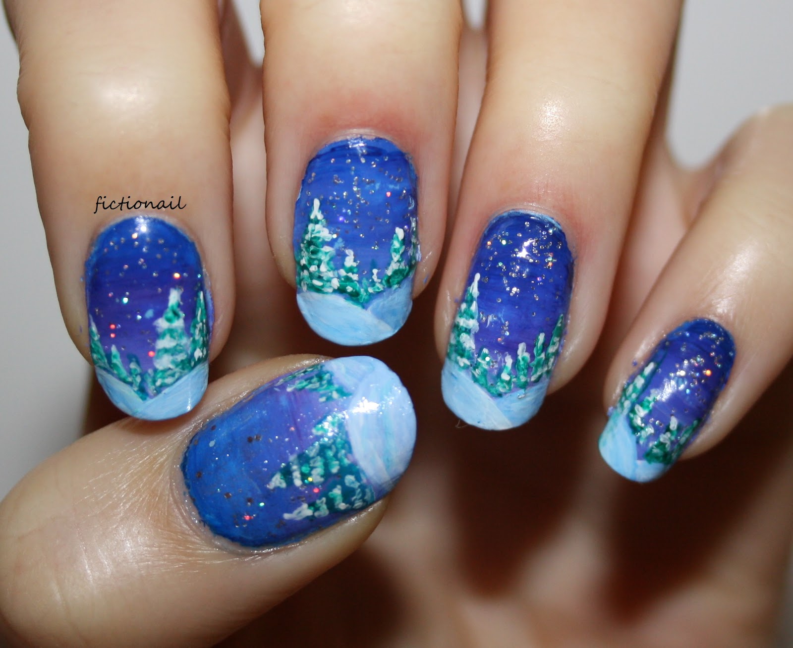 3. Glittery Winter Wonderland Nails - wide 11