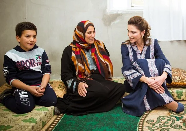 Queen Rania of Jordan wears Basmet Al-Khair Charitable Society' traditional Jordanian dress. Queen Rania wore Talitha Salma embroidered dress