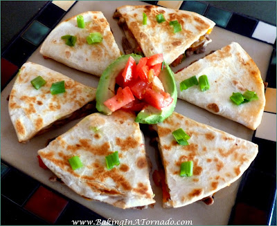 Steak Fajita Quesadillas: All the flavors of a fajita in a pan fried crunchy quesadilla | Recipe developed by www.BakingInATornado.com | #recipe #lunch #dinner