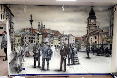 Artystyczne graffiti Malowanie graffiti na ścianie w salonie, obraz namalowany na scianie przedstawia Plac Zamkowy w Warszawie