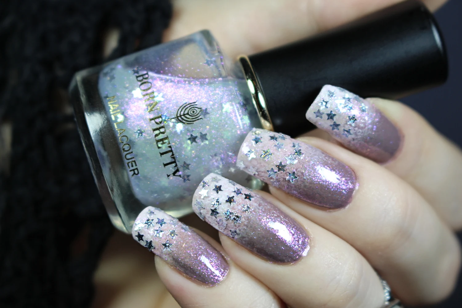 a close-up of a sparkly nail look with lilac and white gradient, inspired by fairycore