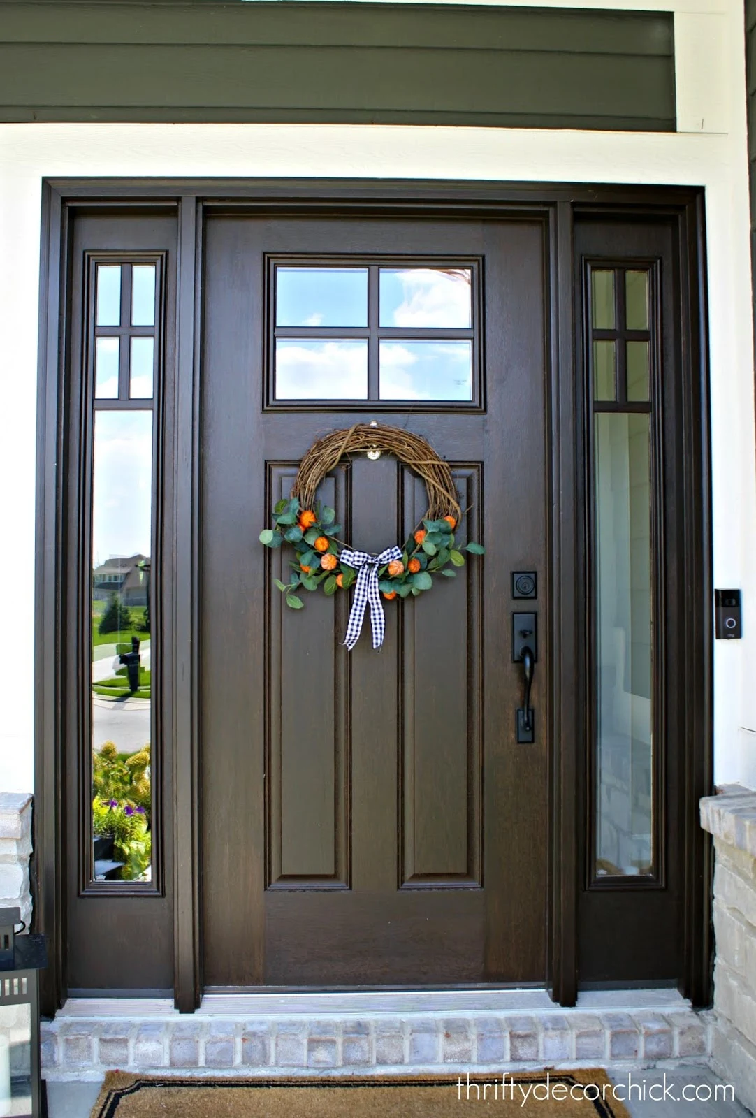 Craftsman stained door with windows and sidelights