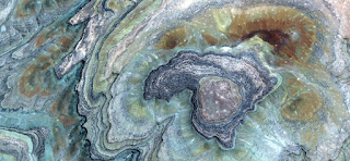 Concentric stone structures,,nature imitating art,composition,abstract landscapes of deserts,Abstract Naturalism,abstract photography deserts of Africa from the air,abstract surrealism,fantasy colors Concentric stone structures,,nature imitating art,composition,abstract landscapes of deserts,Abstract Naturalism,abstract photography deserts of Africa from the air,abstract surrealism,fantasy colors
