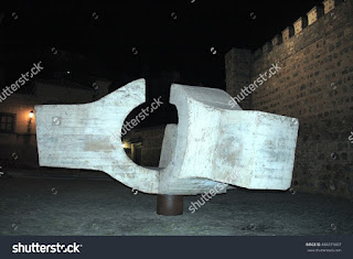 Meeting point Juantegui Eduardo Chillida sculpture in the Plaza de Fernando VI of Toledo, Spain, ironwork and concrete, a prominent follower of the tradition of Julio González and Pablo Picasso. Meeting point Juantegui Eduardo Chillida sculpture in the Plaza de Fernando VI of Toledo, Spain, ironwork and concrete, a prominent follower of the tradition of Julio González and Pablo Picasso.