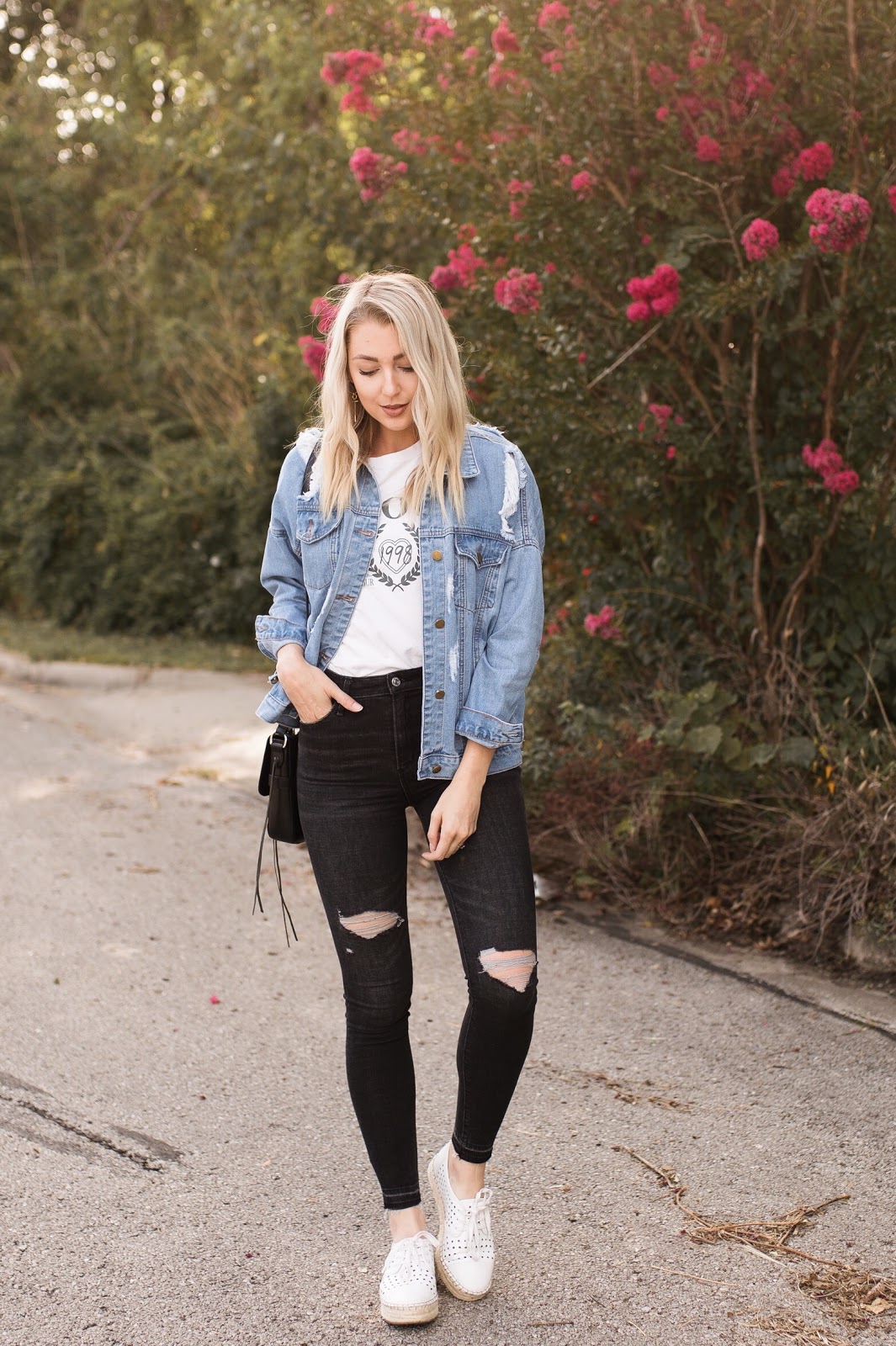 oversized jean jacket with skinnies and a graphic tee