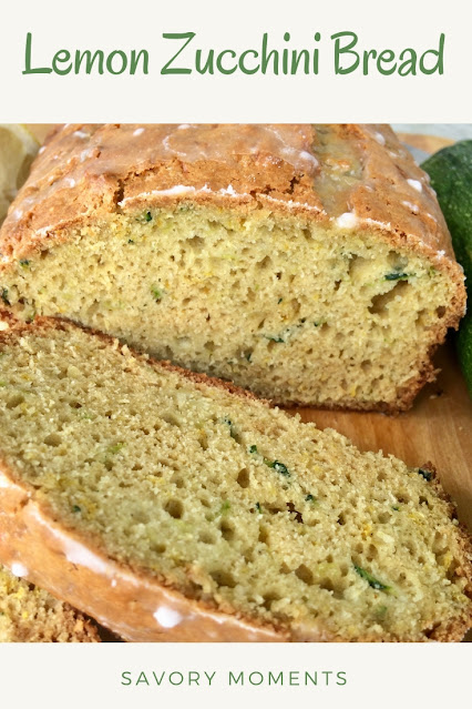 Side view of the inside of a loaf of lemon zucchini bread with glaze on top.
