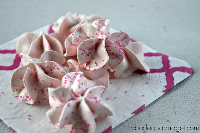 Edible wedding favors are the best. These Homemade Meringue Cookies Wedding Favors are simple, delicious, and budget-friendly favors. Get the recipe at www.abrideonabudget.com.
