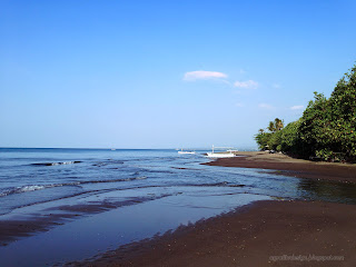 Fishing Beach View With Flow Of River Mouth To The Sea At Tangguwisia Village, Seririt, North Bali, Indonesia