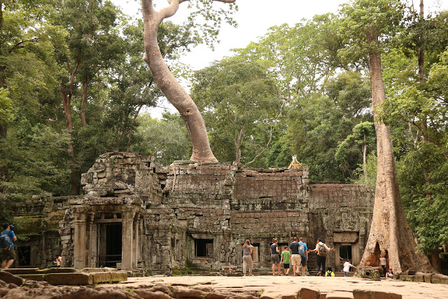 Walking towards to the entrance of Tra-Prohm Temple where Angelina Jolie had her scenes in Tom Rider movie at Siem Reap in Cambodia Walking towards to the entrance of Tra-Prohm Temple where Angelina Jolie had her scenes in Tom Rider movie at Siem Reap in Cambodia