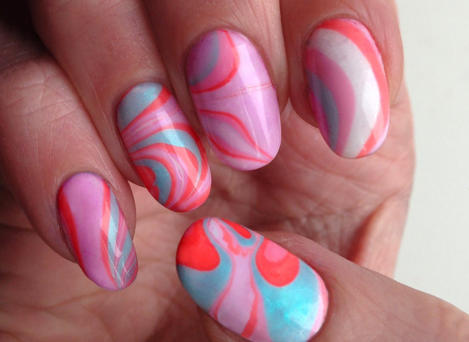 6. Striped Rainbow Water Marble Nail Art Designs to Try - wide 8
