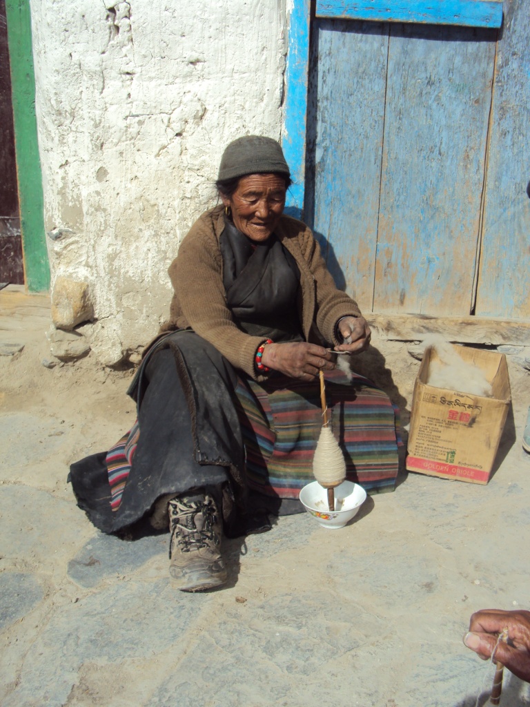 digitalgallery: Making thread from the wool.