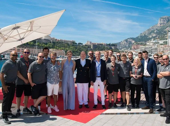 Princess Charlene wore Federica Tosi striped poplin jumpsuit. Scottish Formula 1 pilot David Coulthard and Australian former Formula 1 pilot Mark Weber in Monaco