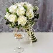 Handbouquet bunga mawar putih