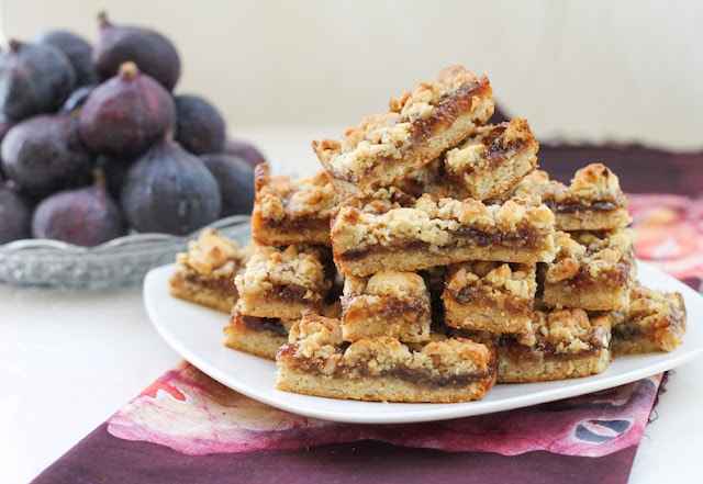 Food Lust People Love: Sticky, chewy, fig pecan bars are the perfect treat with a cup of tea or an ice-cold glass of milk. Baked up in a large pan, this recipe makes enough to share, but they also freeze beautifully so you don’t have to. Use your favorite preserves or jam if you don’t have fig.