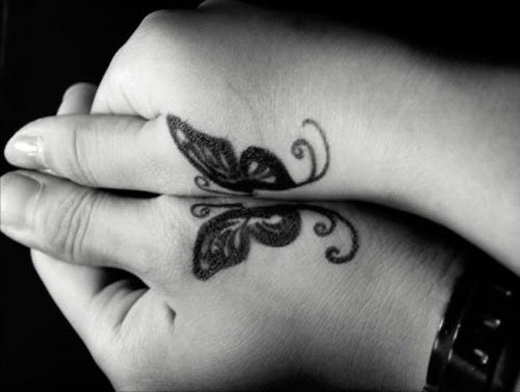 Charming Butterfly Hands Tattoo Designs