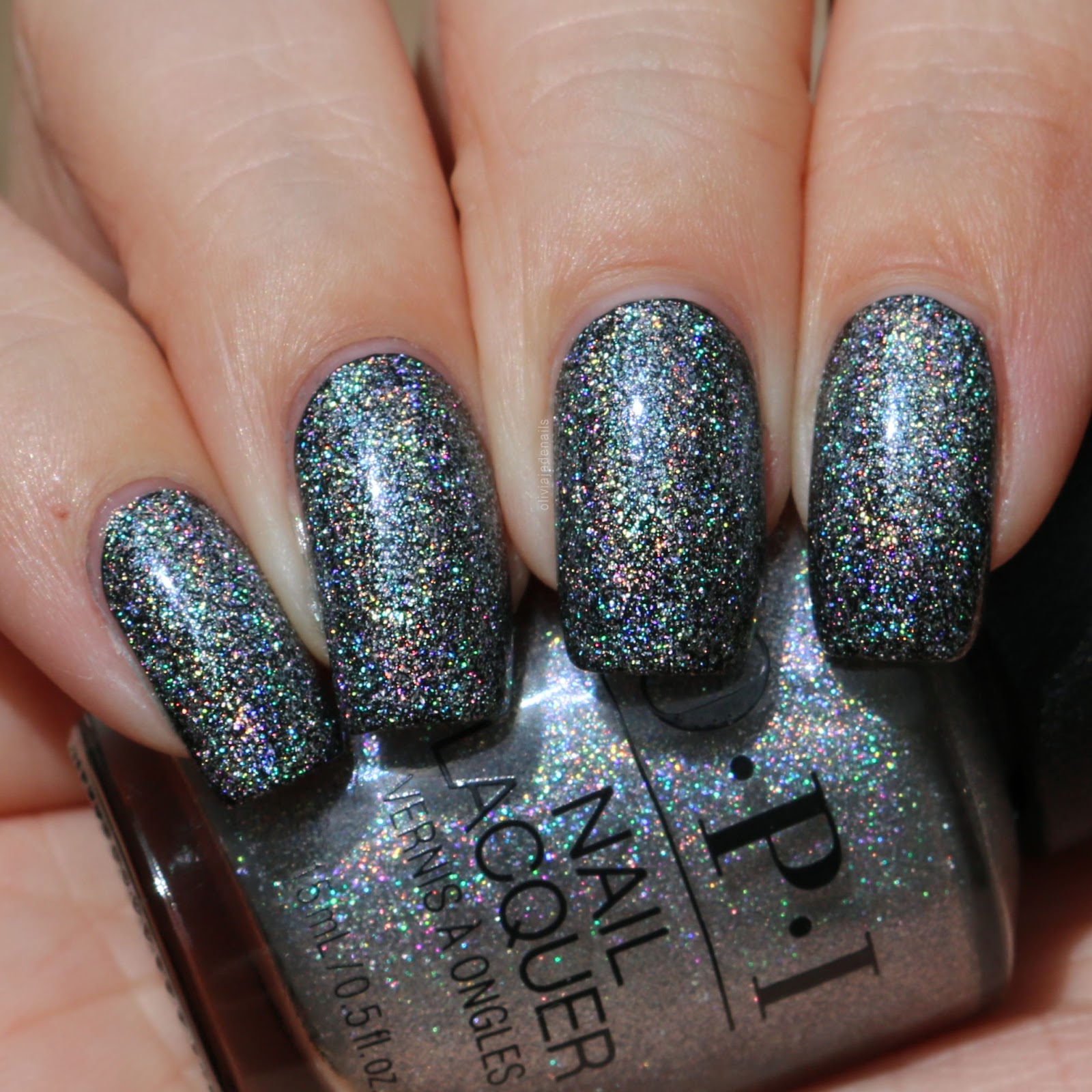 OPI Tinker, Thinker, Winker? (over black) swatched by Olivia Jade Nails
