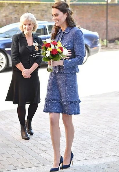 Kate Middleton wore Rupert Sanderson Malory Storm Suede Pumps and carried Russell and Bromley Clutch bag