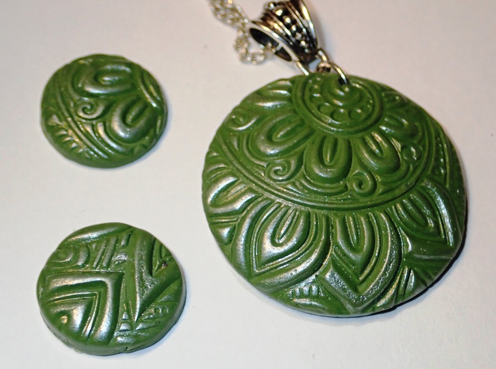 Polymer clay necklace using stamps and embossing folder