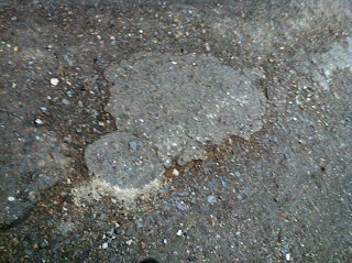 lumpy uneven paving that wheelchair wheels are prone to catching on and making you land on your chin #1