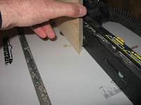 Routing the inside edge of the cabinet fronts 